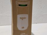 a brown box with a green lid on a white table