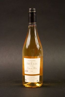 a bottle of wine that is sitting on a table
