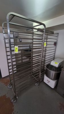 an image of a commercial kitchen with stainless steel racks