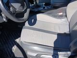 a picture of a car interior with a steering wheel