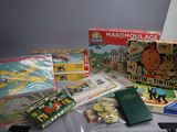 a table with a bunch of toys and books on it