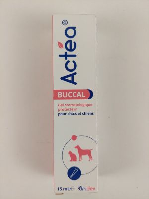 un gros plan sur un tube de dentifrice orné d'un chien