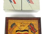 two boxes of cigarettes with flags and a box of matches
