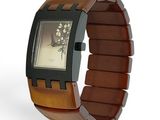 a watch that is sitting on top of a wooden bracelet