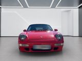 a red sports car parked in a white room