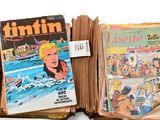 un grand nombre de livres empilés les uns sur les autres