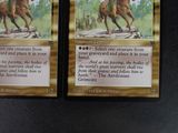 two cards that have a picture of a man on a horse