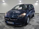 la photo d'une voiture bleue garée dans un garage