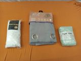 un lit sur lequel se trouvent un drap, un oreiller, un oreiller et une taie d'oreiller