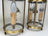 two lamps that are sitting next to each other on a table