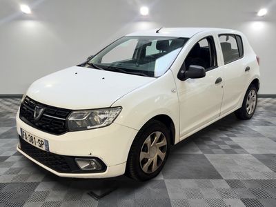 the white dacia is parked in a room with a checkered floor
