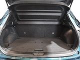 a trunk of a car with the back door open