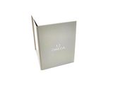 an image of a white box with the word omega on it