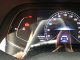 a close up of a car ' s dashboard with a speedometer