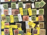 a lot of different stamps on the wall