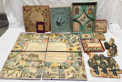 an image of a table topped with lots of books and other items