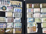 many different types of stamps in a black case