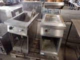 deux machines posées sur une palette dans un entrepôt