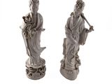 paire de statues chinoises représentant une femme et un homme muni d'un bâton