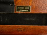 an old sewing machine with a label on it ' s side