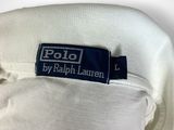 polo by ralph lauren label on a white polo shirt