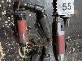a bunch of tools hanging on a wall in a garage