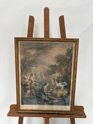 un vieux tableau posé sur un chevalet, représentant un homme et une femme