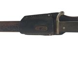un couteau posé sur un porte-couteau