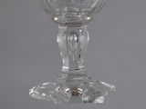 a clear glass cup that is sitting on a table