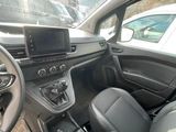 the interior of a car with a steering wheel, dashboard, and dash board