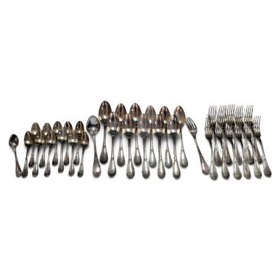 a lot of silver spoons and forks on a white surface