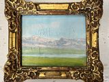 peinture d'un paysage avec des montagnes en arrière-plan