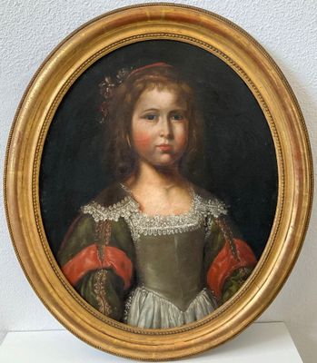 portrait of a young girl in a green dress with a red sash