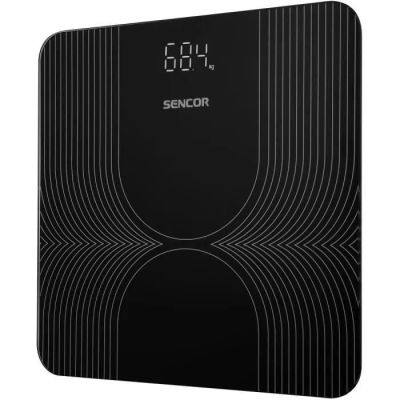 une balance électronique en noir et blanc équipée d'une horloge numérique