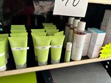 a shelf with a lot of skin care products on it