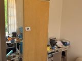 an image of a bedroom with a closet and a bed