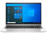 l'ordinateur portable est ouvert sur une surface blanche avec des fenêtres sur l'écran
