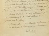 un gros plan d'un morceau de papier sur lequel on a écrit