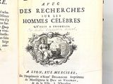 un livre ouvert avec la photo d'un homme et d'une femme