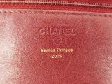 a close up of the inside of a red purse