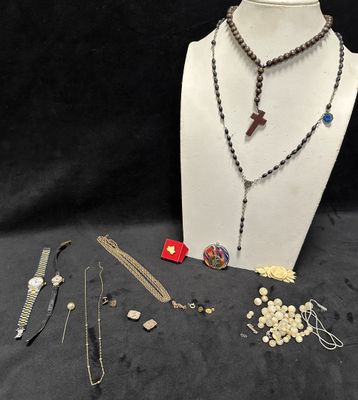 lot of jewelry including necklaces, bracelets, brooches, pins, and pins