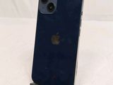 an apple iphone sitting on top of a wooden stand on a white surface