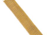 a gold bracelet with a clasp on a white background