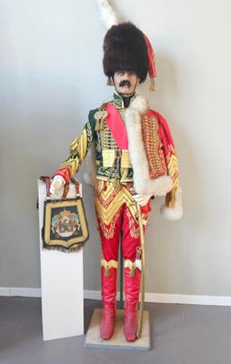 a statue of a man dressed as a soldier