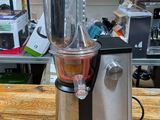 a blender sitting on top of a wooden table