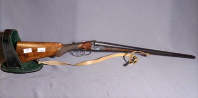 an old rifle with a leather case on a white background