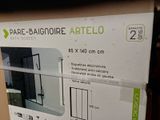 a box that has a picture of a bathroom in it