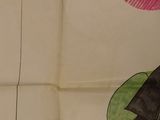 a drawing of a cat on a piece of paper with writing on it