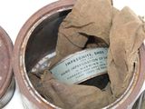 two tins that have some type of paint inside of them