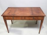 an old wooden table with a drawer on top of it